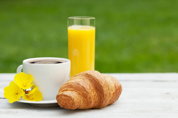 Coffee, orange juice and croissant — Stock Photo, Image