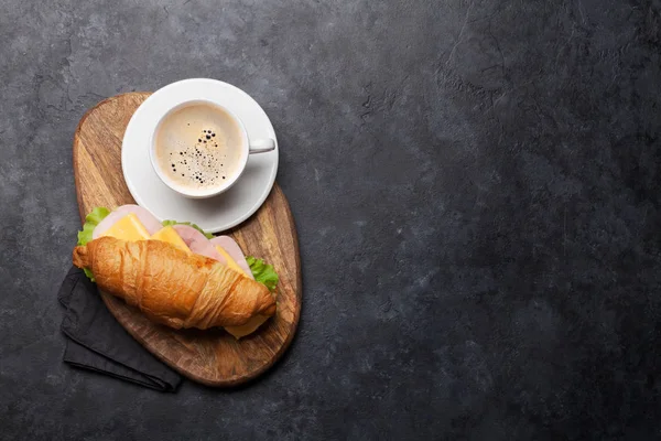 Coffee and croissant sandwich — Stock Photo, Image