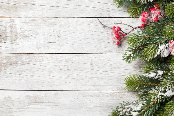 Vánoční přání s větev stromu jedle — Stock fotografie