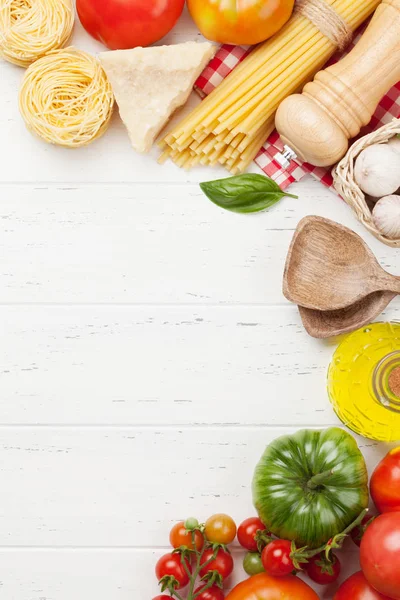 Pasta, tomatoes and herbs — Stock Photo, Image