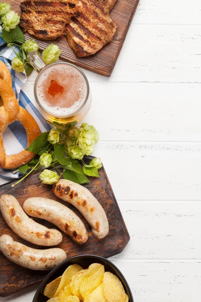 Oktoberfest set. Pretzels, sausages and lager beer — Stock Photo, Image