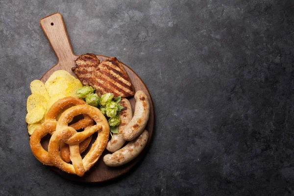 Oktoberfest set. Pretzels, sausages and chips — Stock Photo, Image