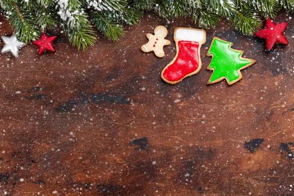 Christmas gingerbread cookies and fir tree — Stock Photo, Image