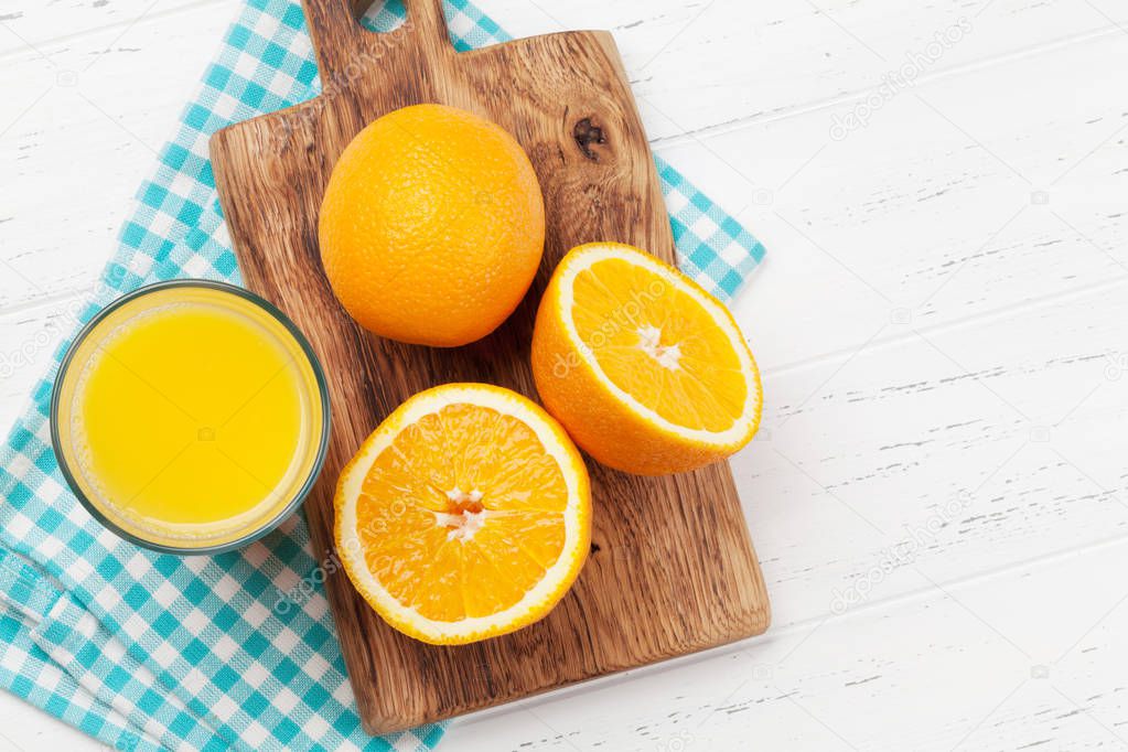 Fresh orange juice and oranges
