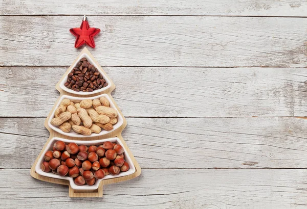 Tarjeta de Navidad con varios frutos secos —  Fotos de Stock