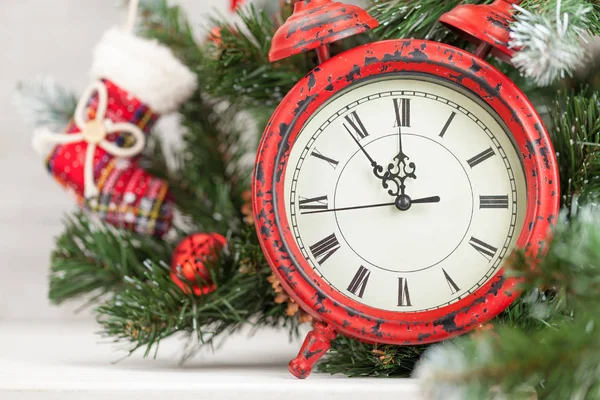 Christmas card with decorated fir tree and clock — Stock Photo, Image