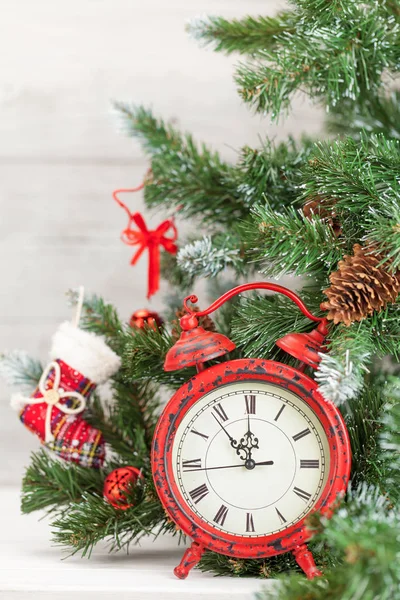 Christmas card with decorated fir tree and clock — Stock Photo, Image