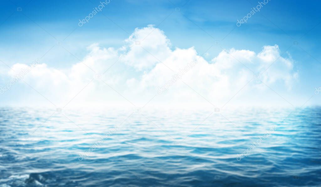 Summer tropical sea with sparkling waves and blue sunny sky. Wide template background