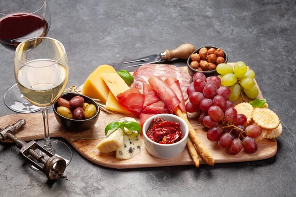 Cheese Meat Grapes Olives Antipasto Appetizer Selection Wooden Board Glasses — Stock Photo, Image