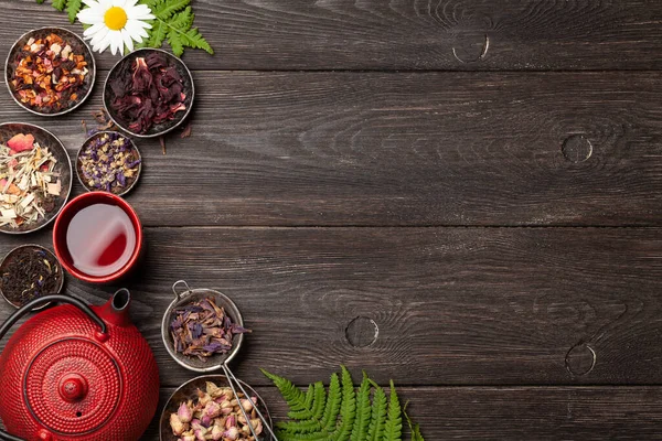 Various Dry Herbal Tea Teapot Cup Wooden Table Top View — Stock Photo, Image