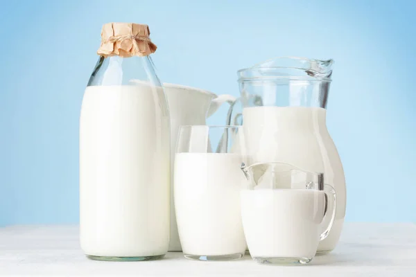 Milk Bottle Jug Glass Cup Front Blue Background — Stock Photo, Image
