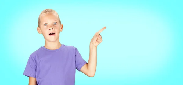 Funny Surprised Boy Pointing Hand Finger Blue Background Copy Space — Stock Photo, Image