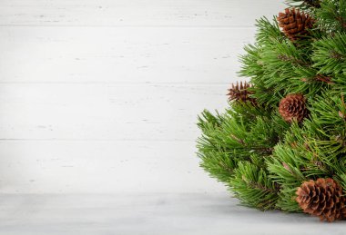 Noel tebrik kartı. Noel kutlaması için içinde köknar ağacı ve boşluk var.