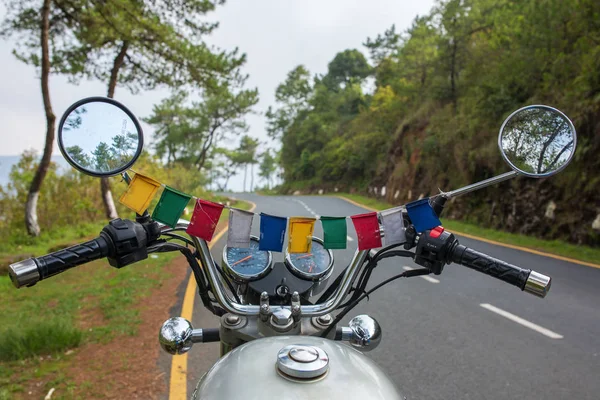 Motorcycling in the North East region of India. View from the rider side.