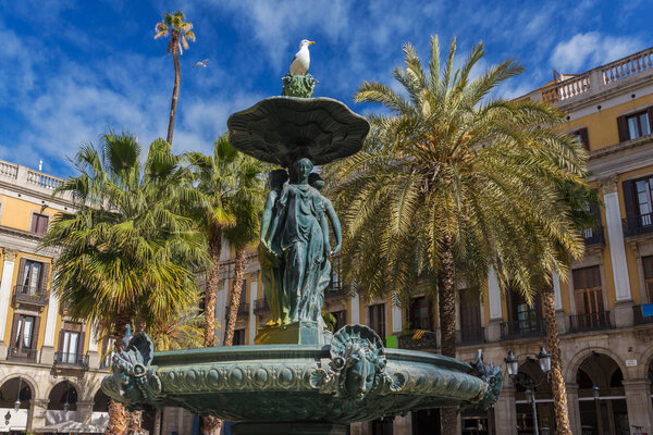Classical Fountain of the Three Graces at Placa Reial in Barcelona, Spain