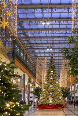 Berlin, Germany - December 6, 2017: Christmas tree in Arkaden shopping mall on Potsdamer Platz in Berlin