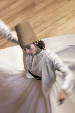 Semazen or Whirling Dervishes at Mevlana Culture Center in Konya, Turkey clipart