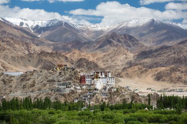 Spituk Monastery with view of Himalayas mountains. Spituk Gompa is a famous Buddhist temple in Ladakh, Jammu and Kashmir, India. clipart