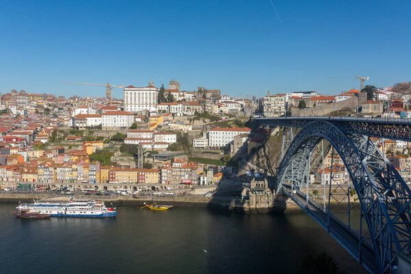 View of the historic city of Porto with famous bridge Ponte dom Luis