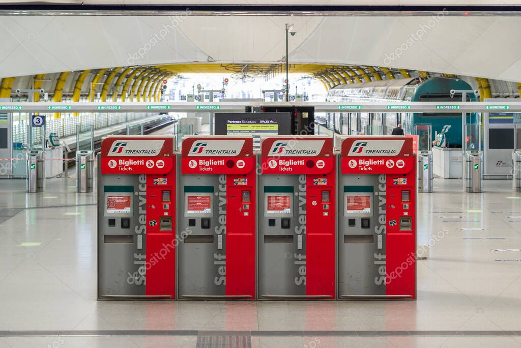 Rome, Italy - june 3, 2020: Ticket machines for trenitalia trains at train station in departure terminal 3 in Rome Fiumicino Airport, Rome, Italy