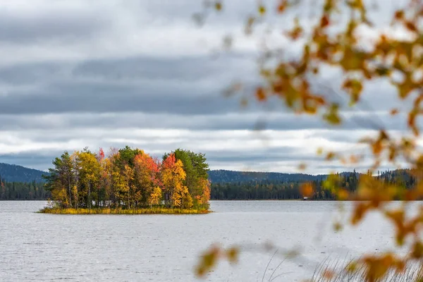 Beautiful autumn landscape with a small island on lake in Finland — Stock Photo, Image