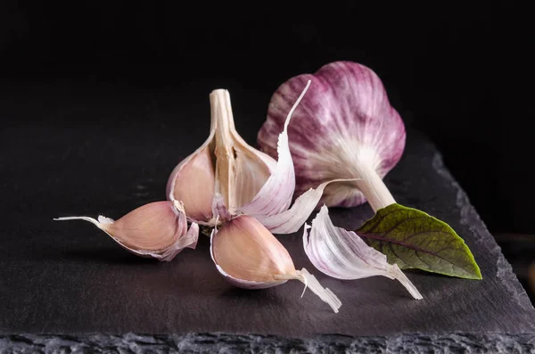 Leaf Basil Garlic Black Stone Table Black Background — Stock Photo, Image