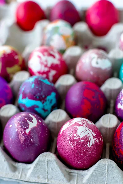 Painted eggs with different colors for Easter