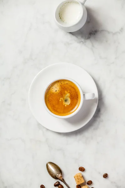 Coffee on white marble background — Stock Photo, Image