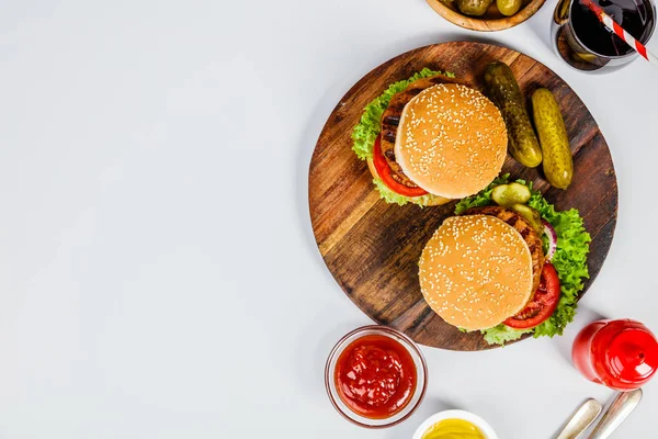 Homemade hamburgers, flat lay — Stock Photo, Image