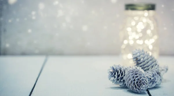 Christmas fairy lights in a mason jar — Stock Photo, Image