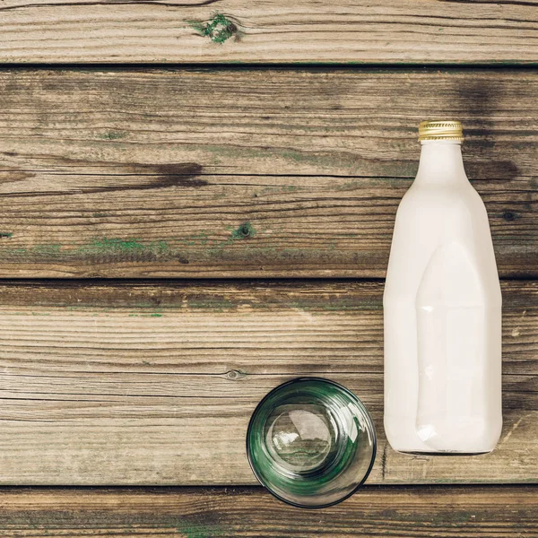 Bottle of milk and glass, space for text — Stock Photo, Image