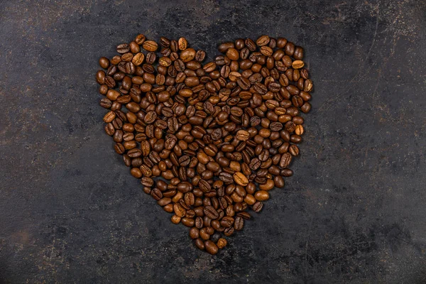 Coffee beans in shape of heart — Stock Photo, Image