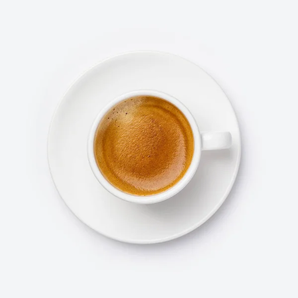 Xícara de café no fundo branco, flat lay — Fotografia de Stock