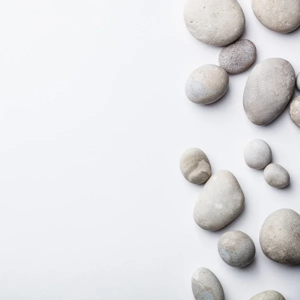 Spa background with grey stones, flat lay — Stock Photo, Image