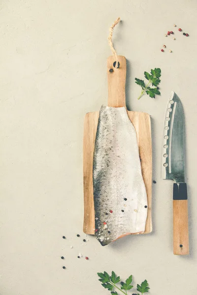 Raw salmon filet on wooden board — Stock Image Raw salmon filet on wooden board Stock Image