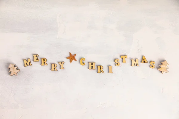 Merry Christmas written with wooden letters, flat lay — 스톡 사진