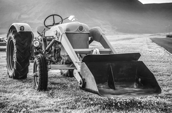 Ancient Icelandic tractor. Retro agriculture machinery.