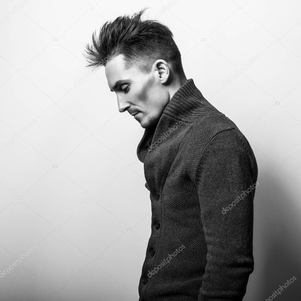 Young stylish handsome man. Black-white photo.