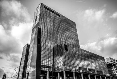 ROTTERDAM, NETHERLANDS - DECEMBER 27, 2016: Modern buildings of business center close-up modern architecture. December 27,2016 in Rotterdam - Netherlands. clipart