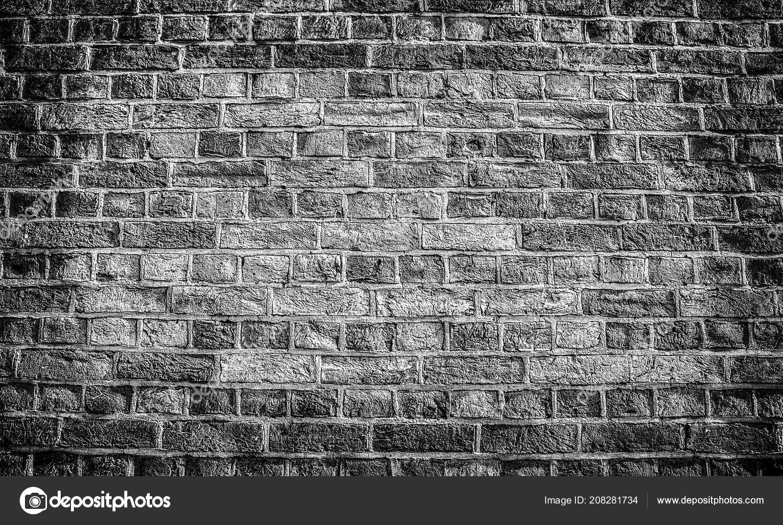 Old stone wall background black white photo stock photo