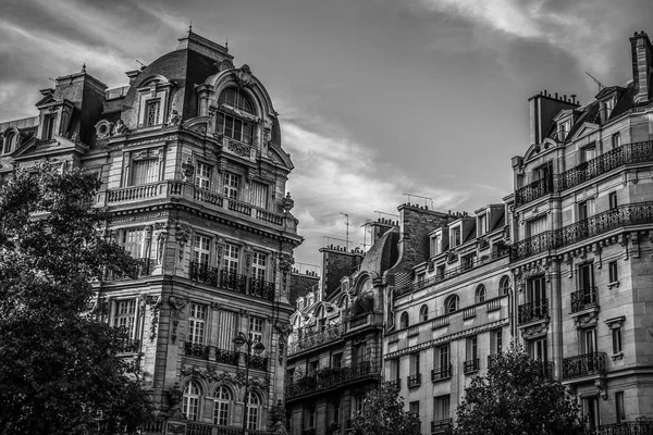 Traditional architecture of Paris buildings. Black-white photo.