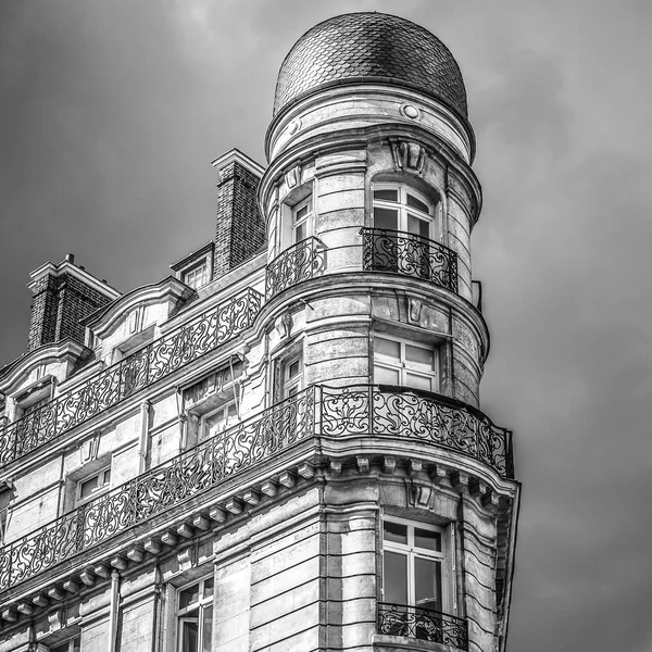 Traditional architecture of residential buildings. Paris - France. Black-white photo.