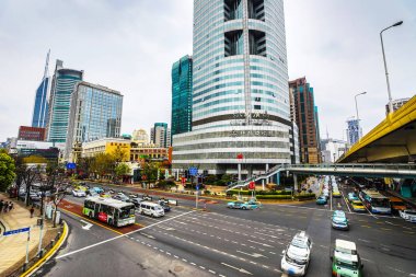 SHANGHAI, HINA - APRIL 03, 2019: Modern central streets of Shanghai and high-rise buildings.
