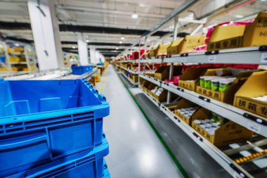 BEIJING, CHINA - JUNE 03, 2019: Modern automation of warehouse production in China. clipart