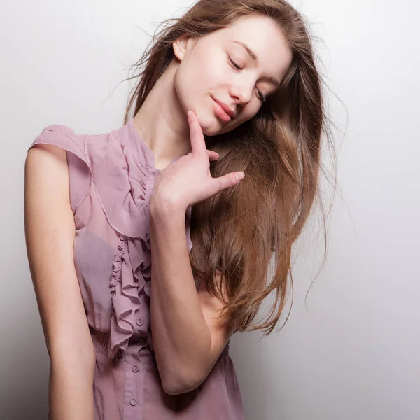 Young beautiful stylish girl posing in studio. — Stock Photo, Image