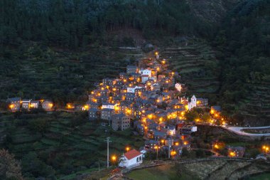 Charming Piodao. A  Schist Heritage, remote  village in Central Portugal nestled on the side of the mountains of Serra do Acor. Piodao Portugal. clipart