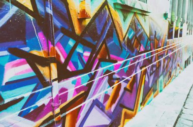 Melbourne, Avustralya - Ekim 2015: Melbourne Bayan tanımlanamayan sanatçının renkli sokak sanatı.