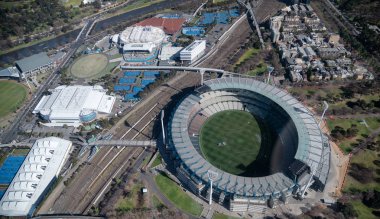 MELBOURNE - SEPTEMBER 8, 2018: Melbourne Cricket Ground aerial view from helicopter. This is the oldest Australian Football League ground. clipart