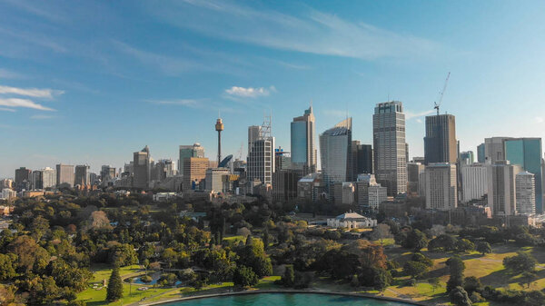 SYDNEY, AUSTRALIA - AUGUST 20, 2018: Aerial panoramic view of city harbour. Sydney attracts 20 million tourists annually.