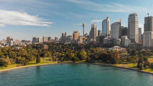 SYDNEY, AUSTRALIA - AUGUST 20, 2018: Aerial panoramic view of city harbour. Sydney attracts 20 million tourists annually.
